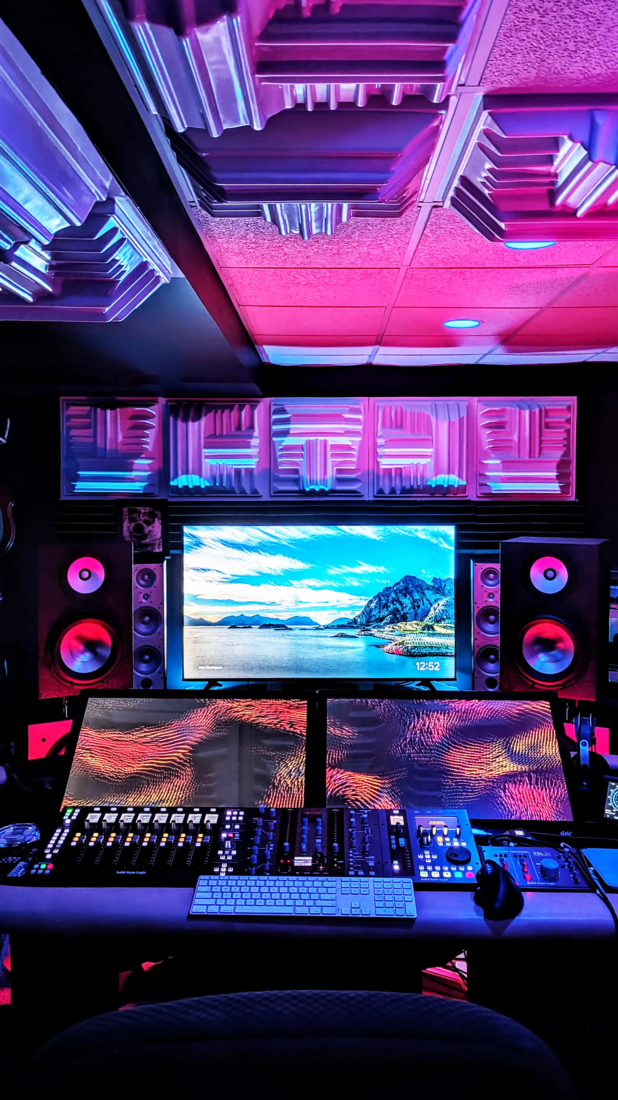 The Social Club room with monitors, console, and analog equipment