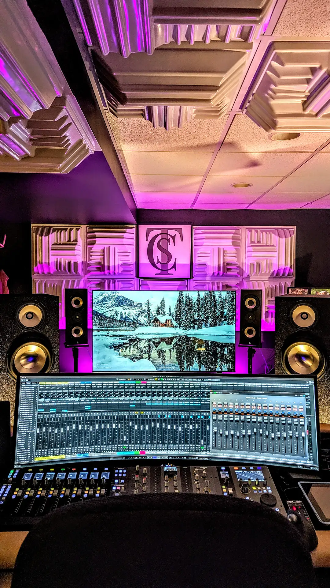 The Social Club control room with monitors and analog equipment