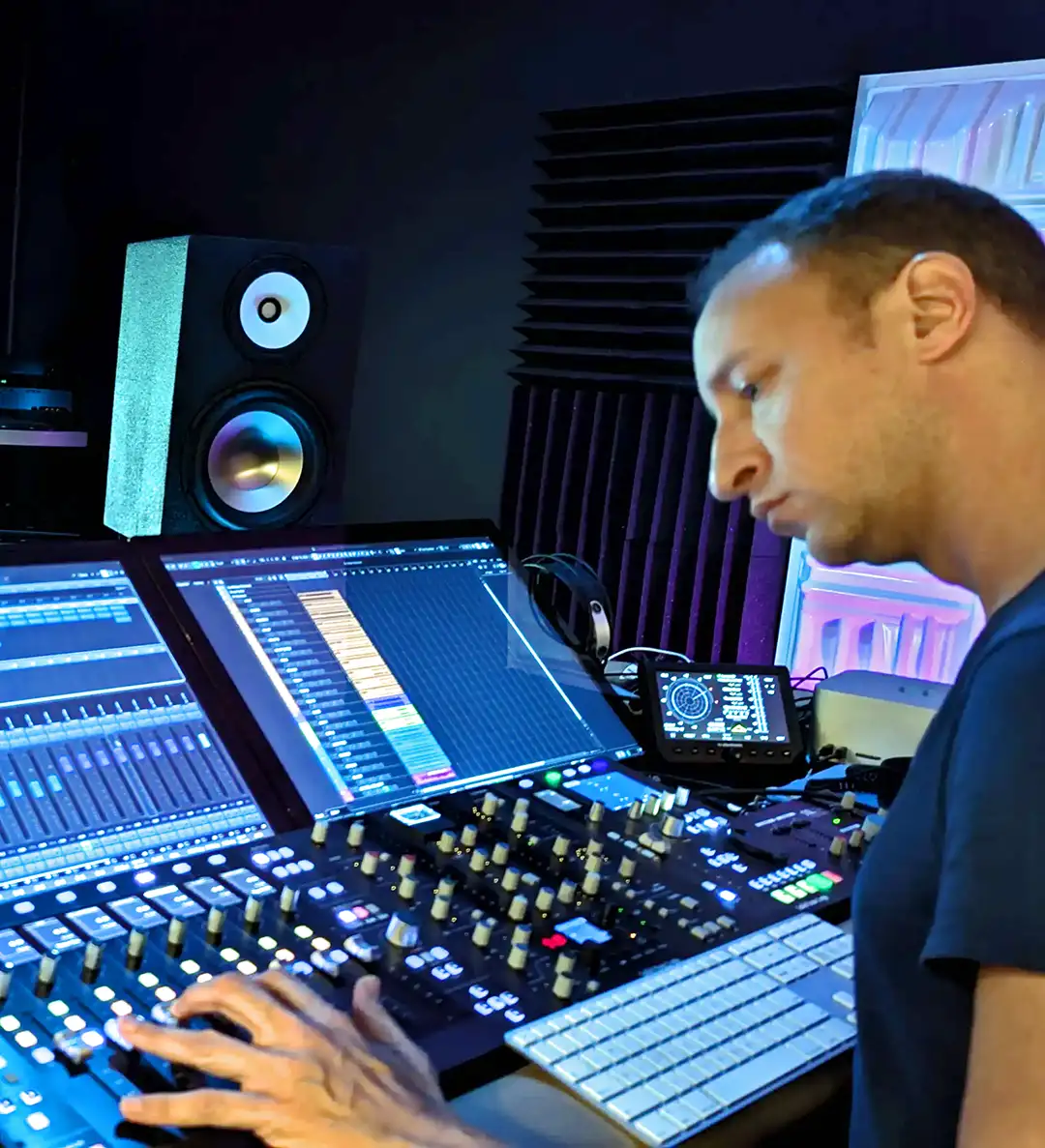 Von Hertzog working at the mixing console in The Social Club studio